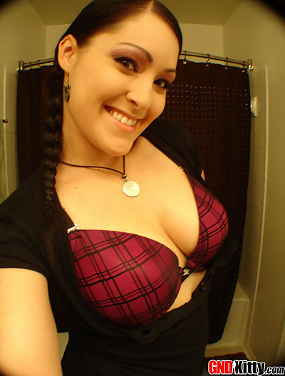Kitty takes off her favorite fredricks bra and plays with her big tits