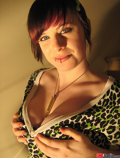 Slutty teen pulls out her big tits from her dress for all to see