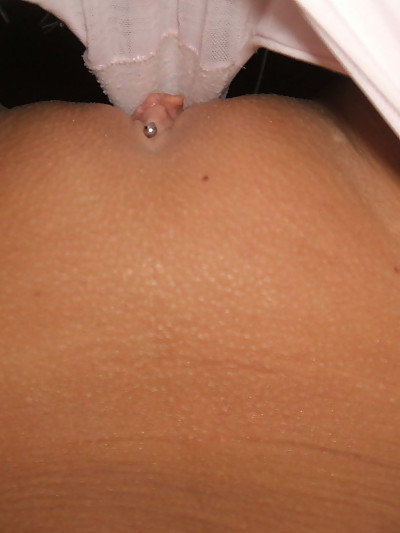 Monroe pulls open her pink panties to show off her pierced pussy