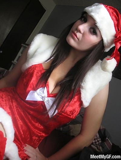 Cute amateur with enormous real titties takes pics of herself naked