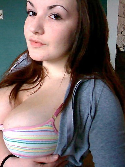 Teen loves to show off her huge perfect round tits