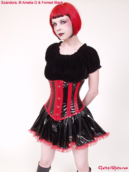 Szandora spooky busty redhead in red and black fetish dress